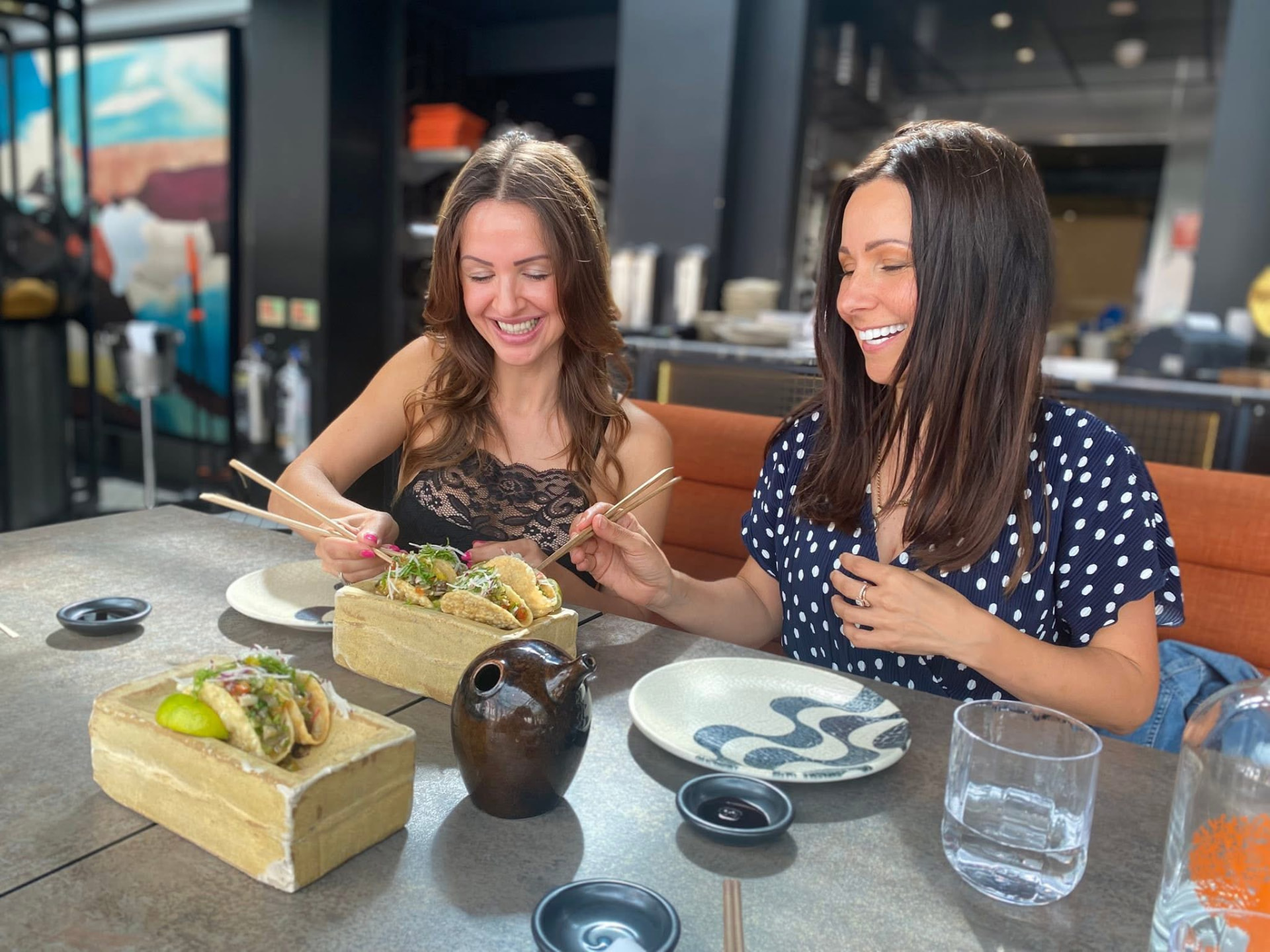 Two women at lunch.